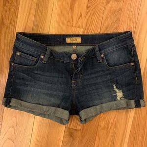 Dark wash distressed denim shorts